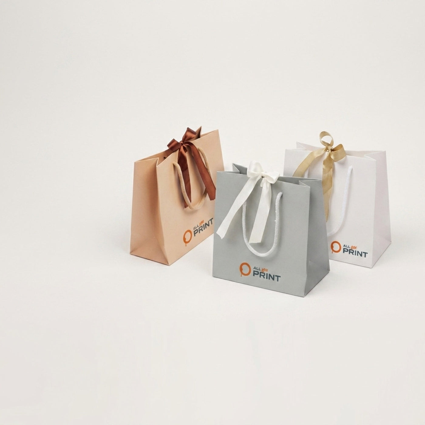 AYP - Muster Papiertragetasche mit Geschenkband